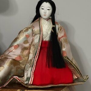 Elegant Japanese Doll with Red and Gold Kimono